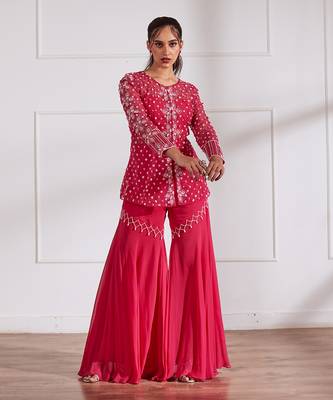 Fuscia net peplum with bustier and gharara 2
