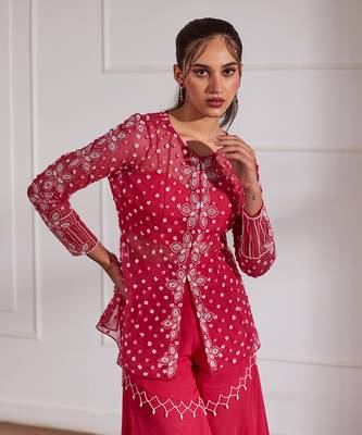 Fuscia net peplum with bustier and gharara 3