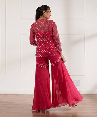 Fuscia net peplum with bustier and gharara 4