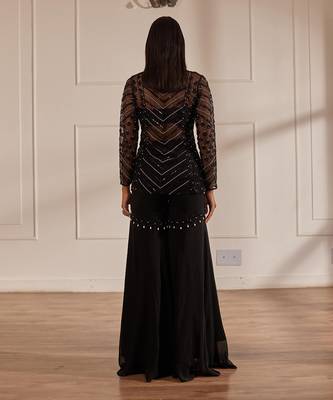 Black net peplum with bustier and gharara 4