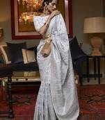Off white color silk blend weaving work traditonal saree