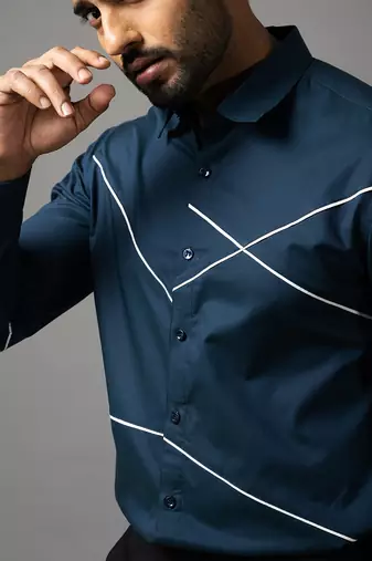 Prussian blue cross stiched shirt