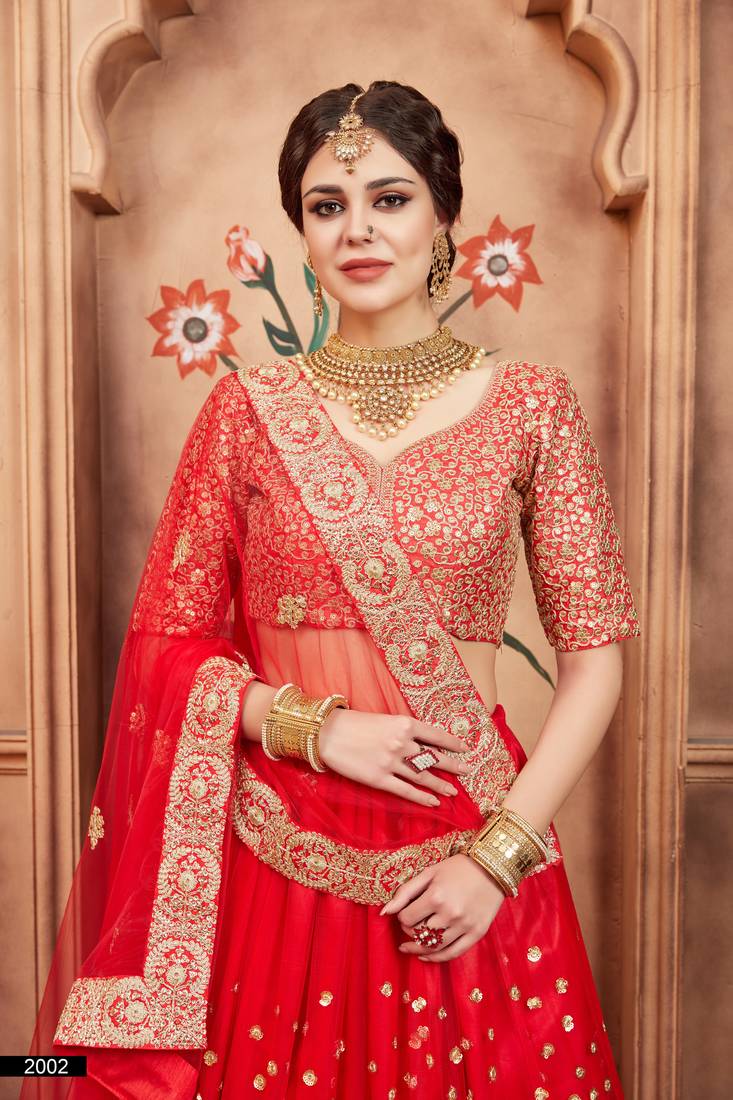 Fusionic red embroidered net lehenga-choli with blouse