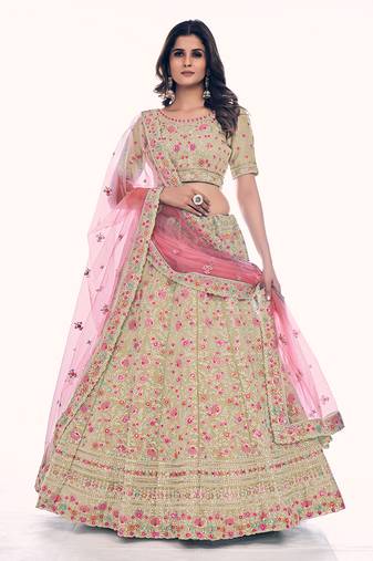 Fusionic cream embroidered silk lehenga-choli with blouse