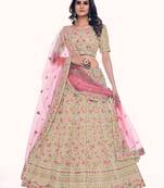 Fusionic cream embroidered silk lehenga-choli with blouse