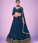 Fusionic peach embroidered net lehenga-choli with blouse