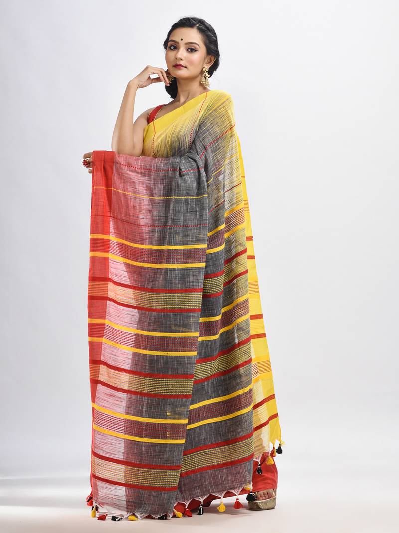 Grey cotton tai dai with solid broder in multi colour pallu hondwaven saree