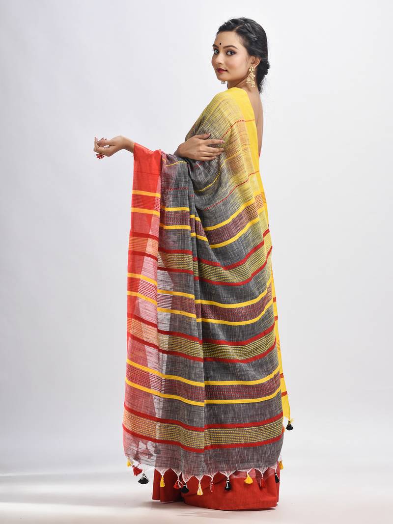 Grey cotton tai dai with solid broder in multi colour pallu hondwaven saree
