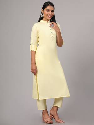 V TRADITION Women Yellow Solid Cotton Blend Kurta with Trouser 1
