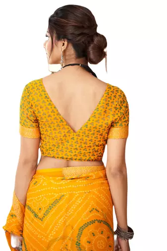 Yellow printed chiffon bandhani saree with blouse