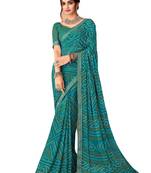 Turquoise printed chiffon bandhani saree with blouse