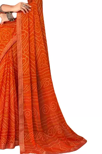 Orange printed chiffon bandhani saree with blouse