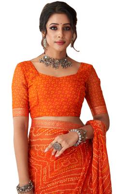 Orange printed chiffon bandhani saree with blouse 4