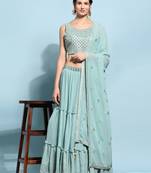 JustFashion Blue Tiered Lehenga Set With Mirror Embroidered Blouse,Jacket And Dupatta