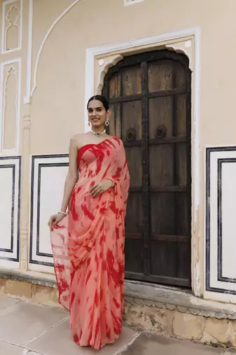   Peach red hand dyed shibori bandhani chiffon saree with blouse