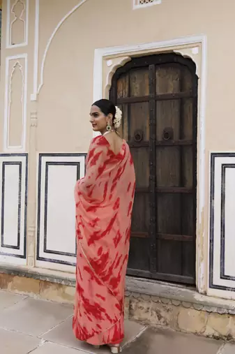   Peach red hand dyed shibori bandhani chiffon saree with blouse