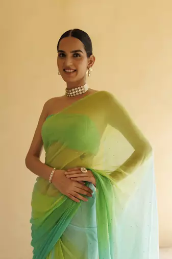 Green shaded mukaish hand embroidered chiffon saree with blouse
