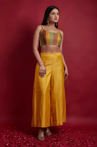 Multi colored top with flared palazzo