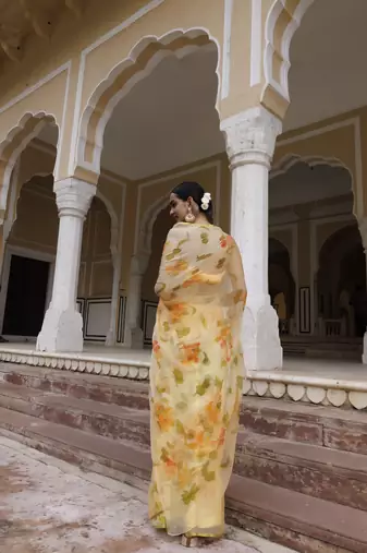   Yellow hand painted floral chiffon saree with blouse