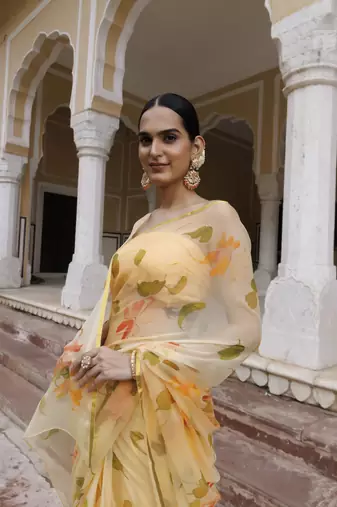   Yellow hand painted floral chiffon saree with blouse