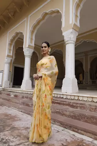   Yellow hand painted floral chiffon saree with blouse