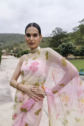   White pink shaded hand painted floral chiffon saree with blouse