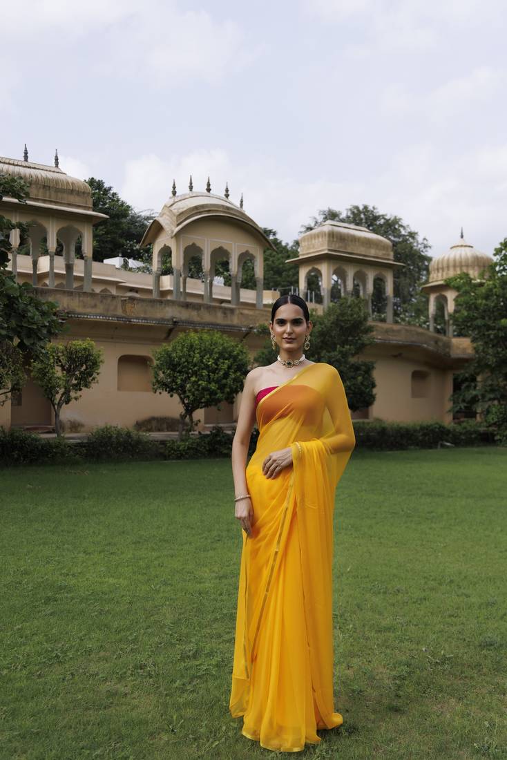 Geroo Jaipur Yellow hand dyed plain chiffon saree with jacquard blouse