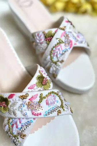 White embroidered wedges