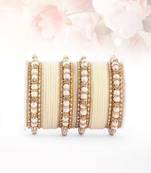 Beige bangles-and-bracelets