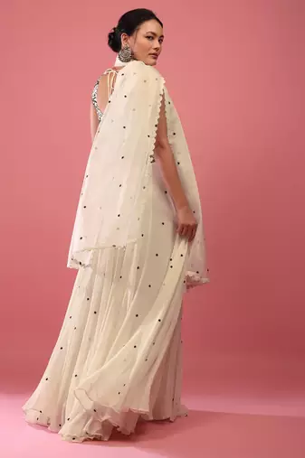 Beige Sequnce Embroidery work Flared Lehenga Choli With Dupatta Semi Stitched.