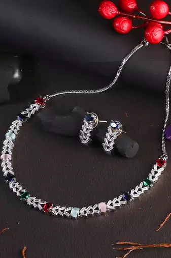 Rodium-plated stone -studded necklace & earring set
