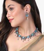 Silver- plated oxidized peacock blue stone jewellery set