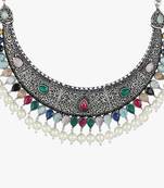 Oxidized stone-studded pearl-tessel necklace and earrings set