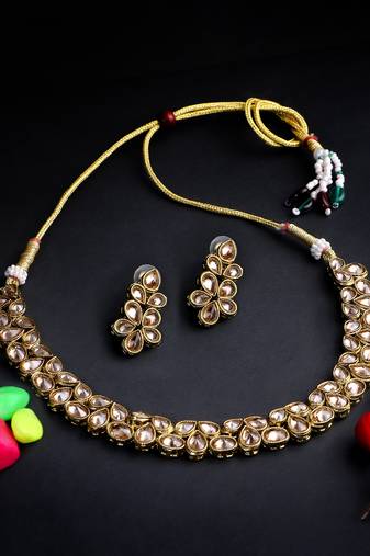 Women gold-plated stone-studded jewellery set