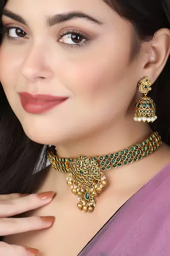 Gold-plated green stone-studded chocker and earrings set