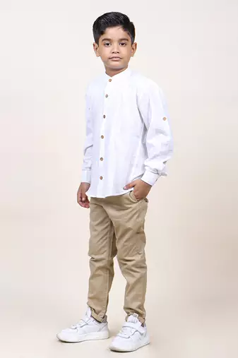 boy's white rolled up cotton shirt