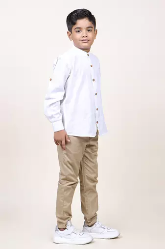 boy's white rolled up cotton shirt