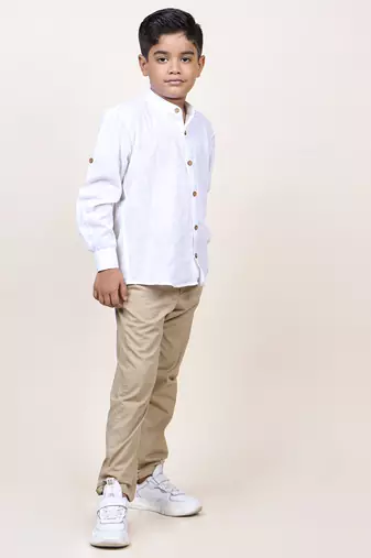 boy's white rolled up cotton shirt