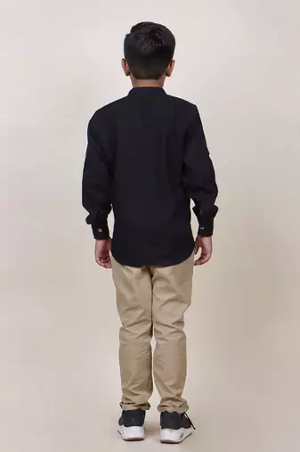 boy's black rolled up cotton shirt