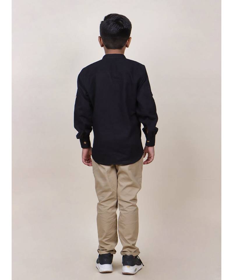 boy's black rolled up cotton shirt