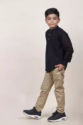 boy's black rolled up cotton shirt