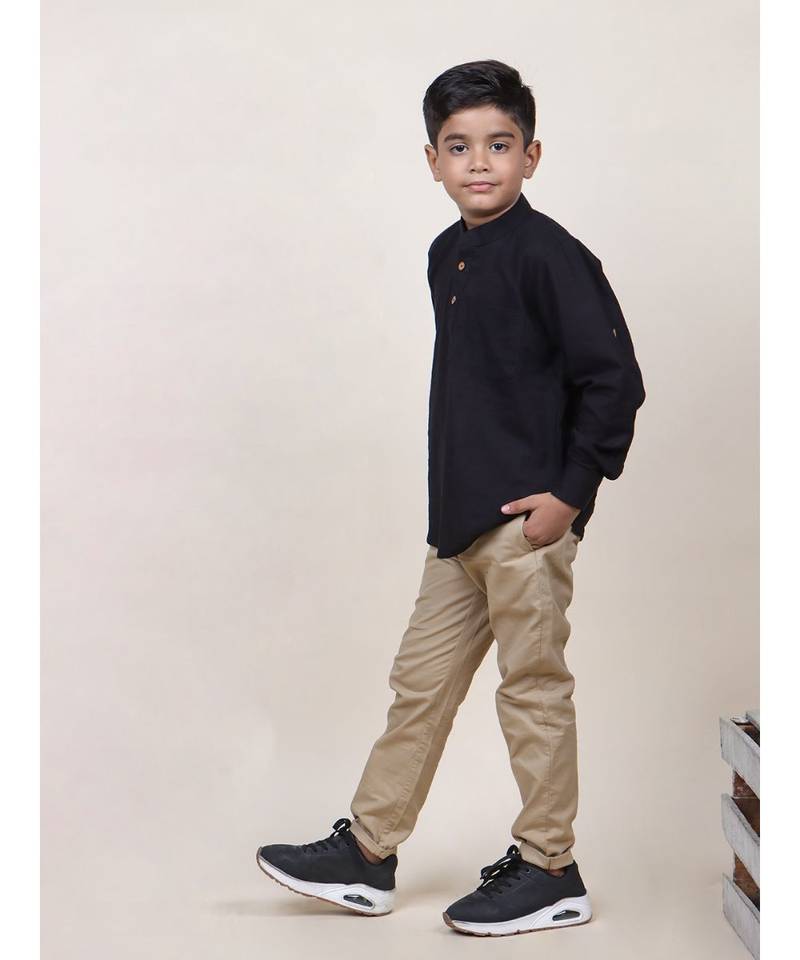boy's black rolled up cotton shirt
