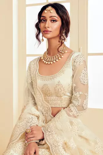Off White Embroidered Net Circular Lehenga With Blouse Up To 42" Size