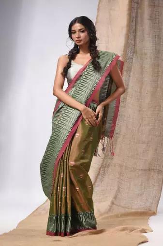 Moss Green Coloured Handwoven Tissue Saree With Woven Design