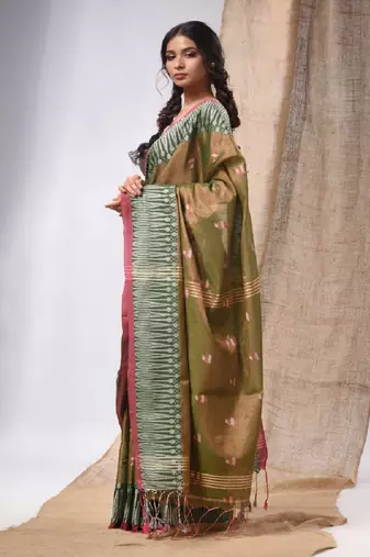 Moss Green Coloured Handwoven Tissue Saree With Woven Design