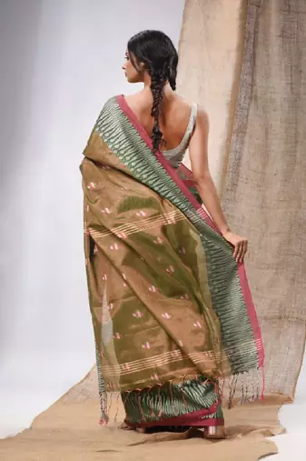 Moss Green Coloured Handwoven Tissue Saree With Woven Design