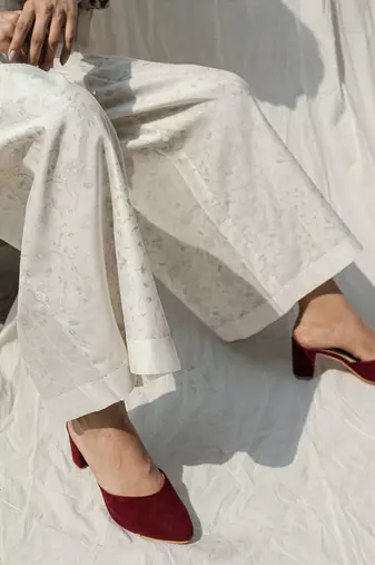 Ivory belle pleated pants