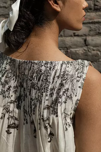 Ivory ilima pleated top
