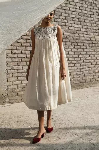 Ivory belladonna pleated neck dress