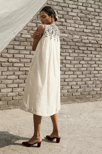 Ivory belladonna pleated neck dress